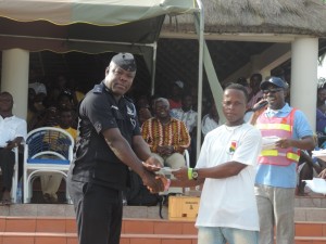 Winner receiving prize from Marine Police