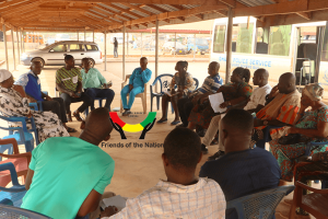 Members-of-Ewoyaa-RNC-listening-during-meeting-with-Kenyasi-RNC